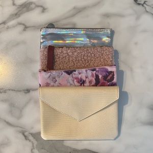 Set of four ipsy bags